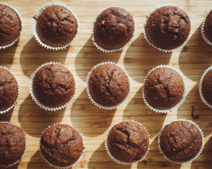 Fourteen muffins on a table