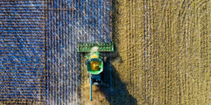 Tractor clearing a field