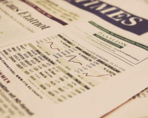 newspaper page showing stocks