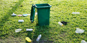 plastic bottles surrounding bin