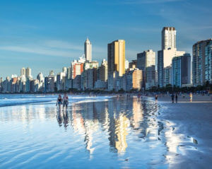 skyscrapers at the edge of a beach