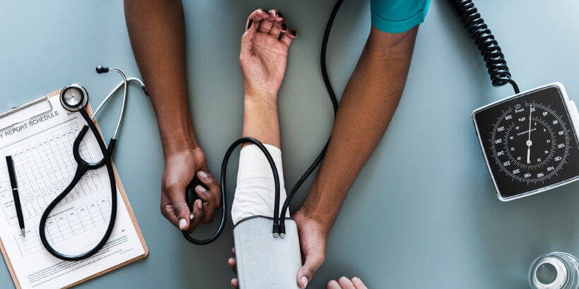 bs_bloodpressuretest_SustainableMedicine taking blood pressure