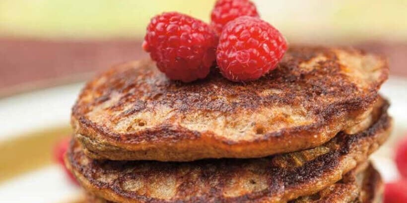 plantain blender pancakes with raspberries on top
