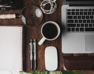 laptop coffee notebook on desk